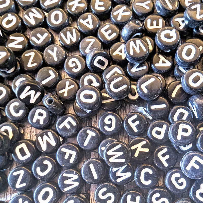 Black Base, White Letters